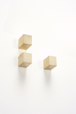 Square Brass Hook is a minimalist design created by USA-based designer Light + Ladder. An extension of the ideas behind Farrah Sit's innovative wall planters, these hooks are yet another way to use walls for storage and decoration.These sturdy but elegant square-shaped hooks are made from solid brass, cut at an angle to keep things from falling off. They can be used for hanging anything from jewelry, to coats, to our own wooden boxes or porcelain planters. (2)