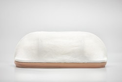 Breadpit is a minimalist design created by Location: -based designer Florian Hauswirth. The design will be displayed at the Youthful Perspectives booth at the upcoming Cologne trade fair. The textile and the wood can be washed separately. The profile of the board has a formal and also practical meaning. The board is like a podium for the bread which can be easily cut on and be taken from the table. (4)