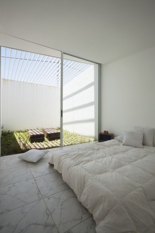 Cisura House is a minimalist house located in Roldán, Argentina, designed by Manuel Cucurell + Sebastián Virasoro. The building is located in an rapidly developing area currently in the process of transformation. The development focuses on providing safety, while also responding to privacy and environmental transitions as well. (2)