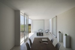 Cisura House is a minimalist house located in Roldán, Argentina, designed by Manuel Cucurell + Sebastián Virasoro. The building is located in an rapidly developing area currently in the process of transformation. The development focuses on providing safety, while also responding to privacy and environmental transitions as well. (13)