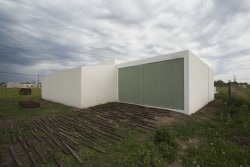 Cisura House is a minimalist house located in Roldán, Argentina, designed by Manuel Cucurell + Sebastián Virasoro. The building is located in an rapidly developing area currently in the process of transformation. The development focuses on providing safety, while also responding to privacy and environmental transitions as well. (1)