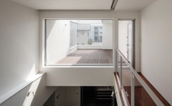 House of Takasaki is a minimalist house located in Gunma, Japan, designed by studio LOOP Architects. The two-family home is located in a quiet residential neighborhood near the Takasaki City Hall. In order to ensure privacy and maximize the site, the home is configured in an L-shape. The living space opens up to the courtyard through a series of sliding doors. (10)