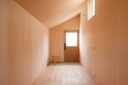 Hut of Inabe is a minimalist house located in Inabe, Japan, designed by Shinobu Ichihara Architects. The wooden structure measures only 9.72 sqm in total floor area. The hut features exposed wood throughout the entire interior, and is lit through three small windows as well as two incandescent light bulbs. (4)