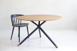 Frisbee is a minimalist design created by Denmark-based designer Herman CPH. The collection includes a dining table, and a set of side and coffee tables. The round dining table is suitable for three to six people, and is made of oiled oak. The frame is black powder-coated metal, with small oak feet. Frisbee coffee and side tables are available in three sizes. The tables works together as a whole or separately. (9)