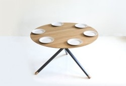 Frisbee is a minimalist design created by Denmark-based designer Herman CPH. The collection includes a dining table, and a set of side and coffee tables. The round dining table is suitable for three to six people, and is made of oiled oak. The frame is black powder-coated metal, with small oak feet. Frisbee coffee and side tables are available in three sizes. The tables works together as a whole or separately. (13)