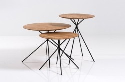 Frisbee is a minimalist design created by Denmark-based designer Herman CPH. The collection includes a dining table, and a set of side and coffee tables. The round dining table is suitable for three to six people, and is made of oiled oak. The frame is black powder-coated metal, with small oak feet. Frisbee coffee and side tables are available in three sizes. The tables works together as a whole or separately. (7)