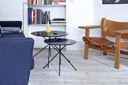 Frisbee is a minimalist design created by Denmark-based designer Herman CPH. The collection includes a dining table, and a set of side and coffee tables. The round dining table is suitable for three to six people, and is made of oiled oak. The frame is black powder-coated metal, with small oak feet. Frisbee coffee and side tables are available in three sizes. The tables works together as a whole or separately. (8)