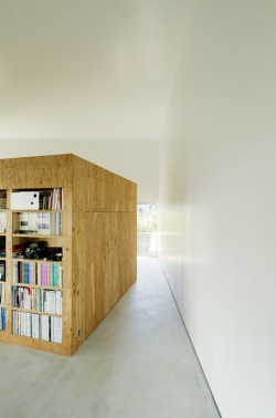 ATMN is a minimalist house located in Hokkaido, Japan, designed by Archilab. The project is characterized by a large wooden volume placed in the center of the spacious one-story residence. (11)