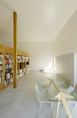 ATMN is a minimalist house located in Hokkaido, Japan, designed by Archilab. The project is characterized by a large wooden volume placed in the center of the spacious one-story residence. (12)