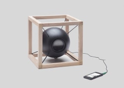 Vitruvio is a minimalist design created by Italy-based designer Soriano Blanco. The speaker “Vitruvio” is a project characterized by simple and geometric shapes: in a structure with the shape of cube is “suspended” a sphere, which is connected to the external structure through rubber thread along the diagonal. (3)