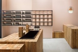 Aesop Osaka is a minimalist interior located in Osaka, Japan, designed by Torafu Architects. It has a glass front with a completely open facade facing the street. The high ceilings, and simple square plane of 7m became the site plan. (6)