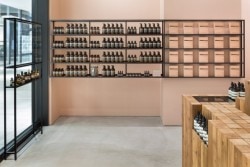 Aesop Osaka is a minimalist interior located in Osaka, Japan, designed by Torafu Architects. It has a glass front with a completely open facade facing the street. The high ceilings, and simple square plane of 7m became the site plan. (8)