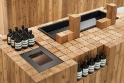 Aesop Osaka is a minimalist interior located in Osaka, Japan, designed by Torafu Architects. It has a glass front with a completely open facade facing the street. The high ceilings, and simple square plane of 7m became the site plan. (9)