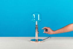 Argand is a minimalist design created by Belgium-based designer Quentin de Coster. The name Argand refers to the Swiss physicist Ami Argand who invented the burner with double airflow and cylindrical wick in 1783. (4)