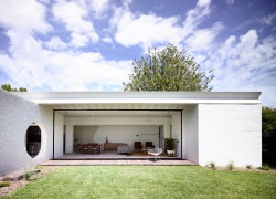 Westgarth House is a minimalist house located in Northcote, Australia, designed by Kennedy Nolan Architects. The site is on a corner in a leafy street. The area is quiet and would not feel out of place in a country town. (1)