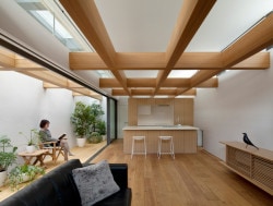 House in Jingumae is a minimalist house located in Tokyo, Japan, designed by Suppose Design Office. The home is characterized by a series of lightwells that provide abundant natural lighting into the open space. (4)