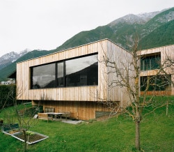 Haus P is a minimalist house located in Bregenz, Austria, designed by Bechter Zaffignani Architekten. The home is situated in a hilly natural landscape overlooking snow-peaked mountain ranges and abundant forests. (2)