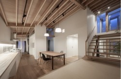KW House is a minimalist house located in Anjo, Japan, designed by WORKCUBE. The two-story wooden residence is tucked between a commercial and residential lot. (4)